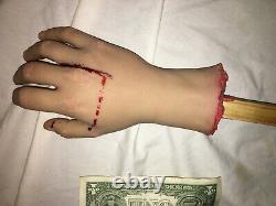 Screen used URETHANE HAND with SLIT FOR KNIFE. Gory, bloody HAND PROP